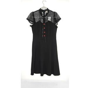 New with tags. Belle Poque black dress. Size medium.